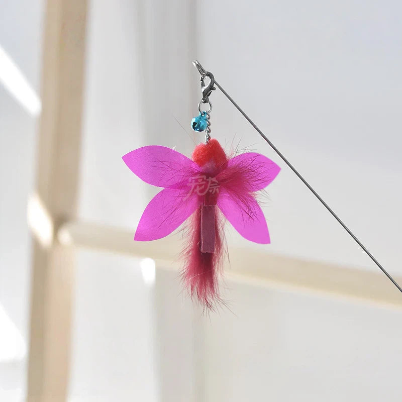 Golden fish retractable cat teaser wand with flowing iridescent ribbon tail for interactive play