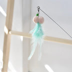 Golden fish retractable cat teaser wand with flowing iridescent ribbon tail for interactive play