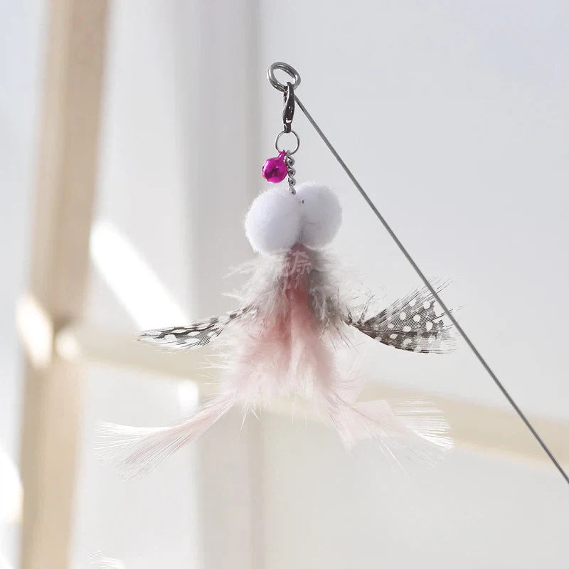 Golden fish retractable cat teaser wand with flowing iridescent ribbon tail for interactive play