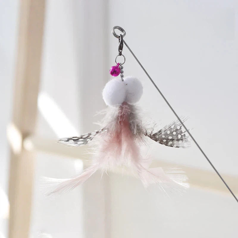 Golden fish retractable cat teaser wand with flowing iridescent ribbon tail for interactive play